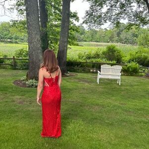 Red prom dress with corset!I originally $650. It fits a size small/ medium.